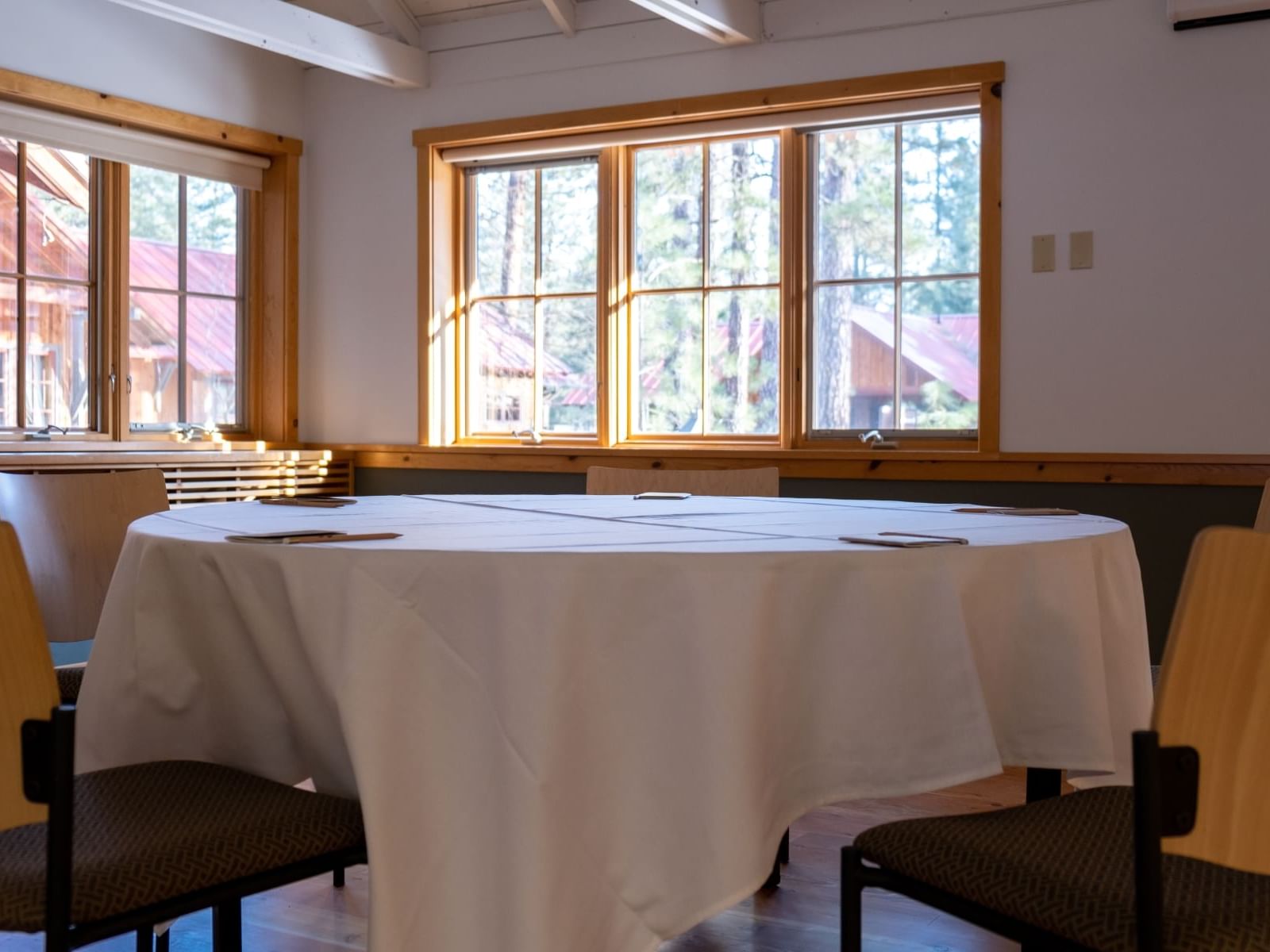 Banquet table setup in Woodpecker at Sleeping Lady