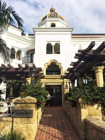Exterior view of the Santa Barbara Inn entrance at daytime