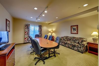 Boardroom with a Large Table at Triple Play Resort Hotel