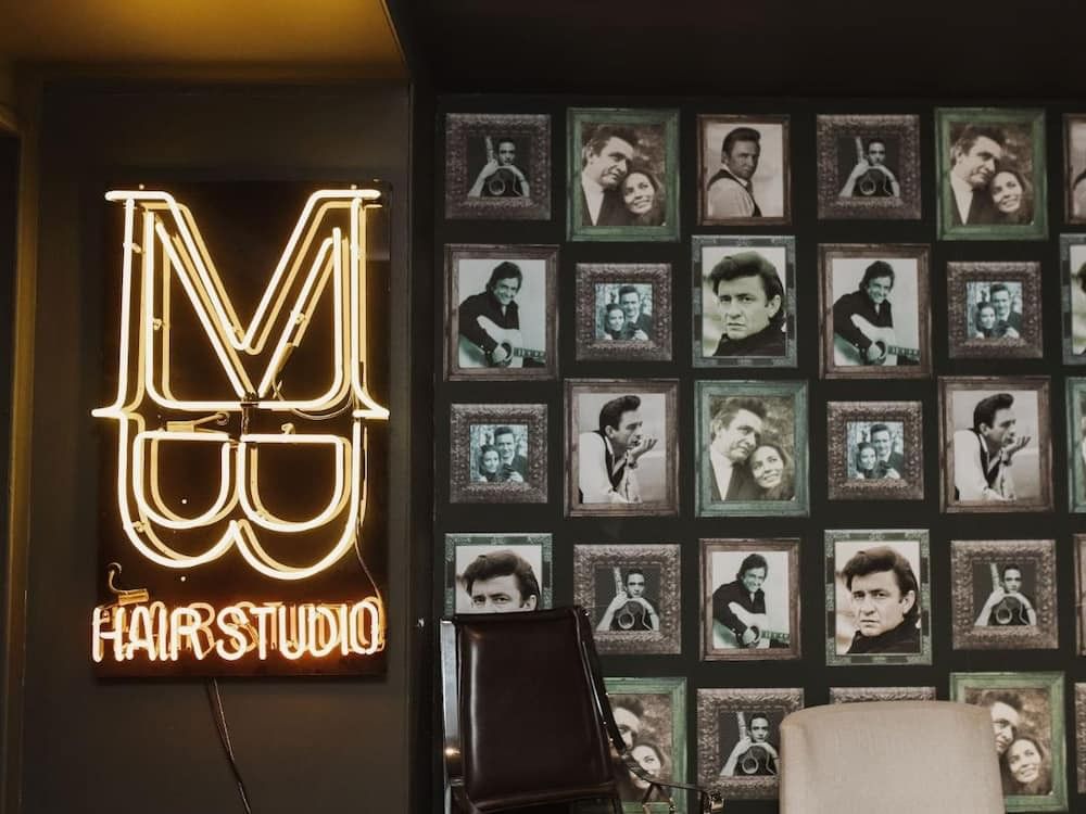 Johnny Cash memorabilia next to the Matte Black hair studio sign