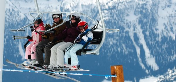 Family on ski lift