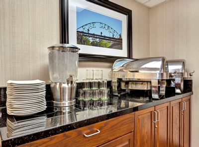 dining area with plates glasses and dishes at Hotel 43