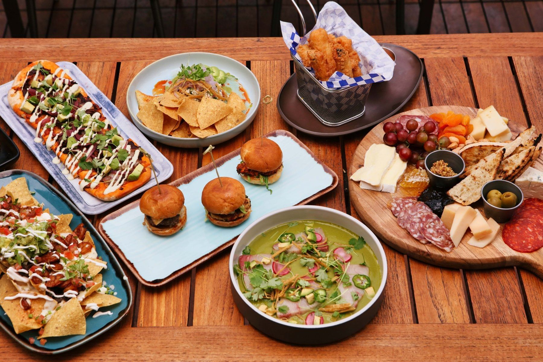 Mini burgers, tacos, nachos & platters served in Topside Terrace Kitchen & Bar at Hotel Republic San Diego