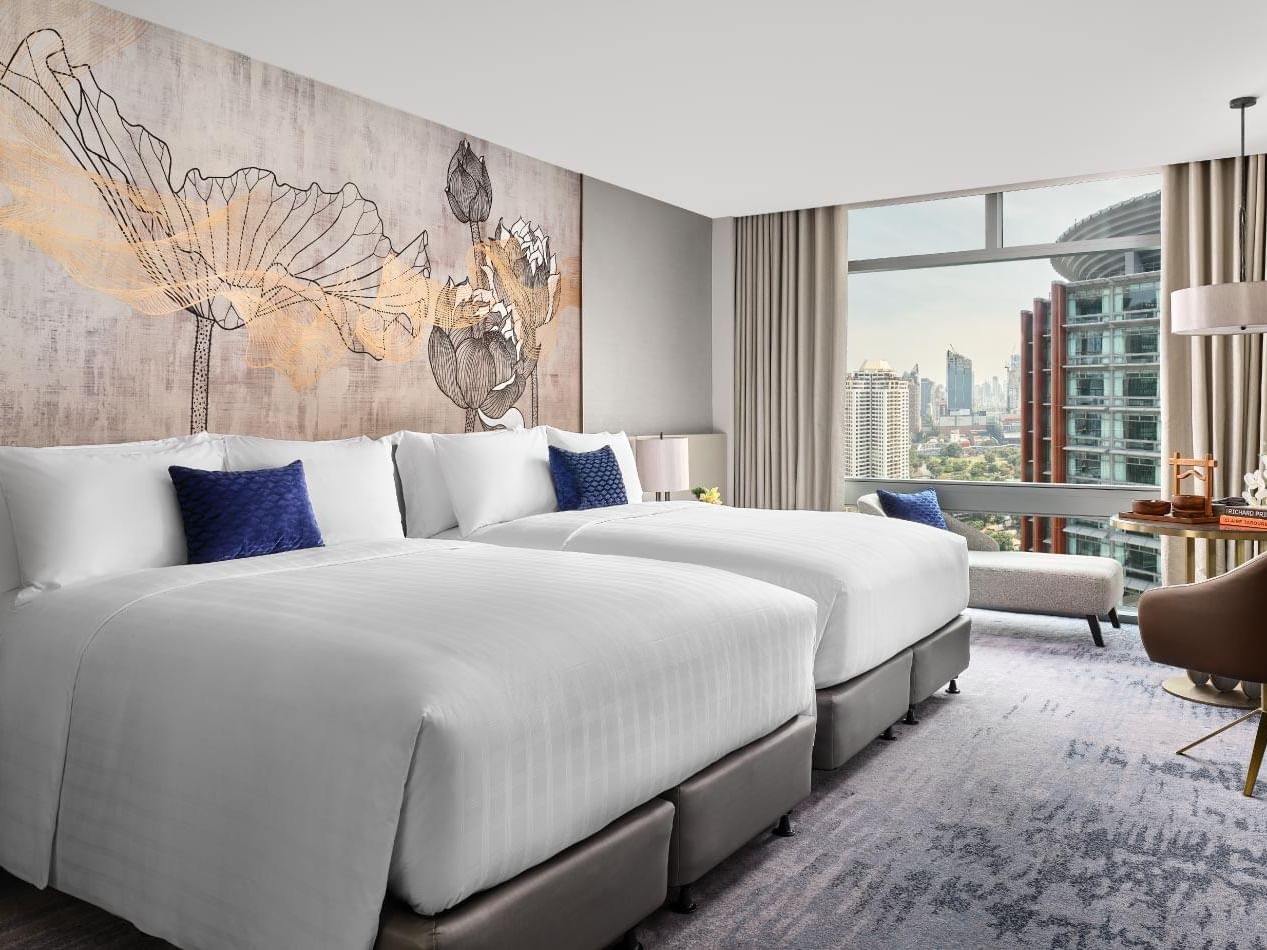 Twin comfy beds in Family Room at Chatrium Grand Bangkok