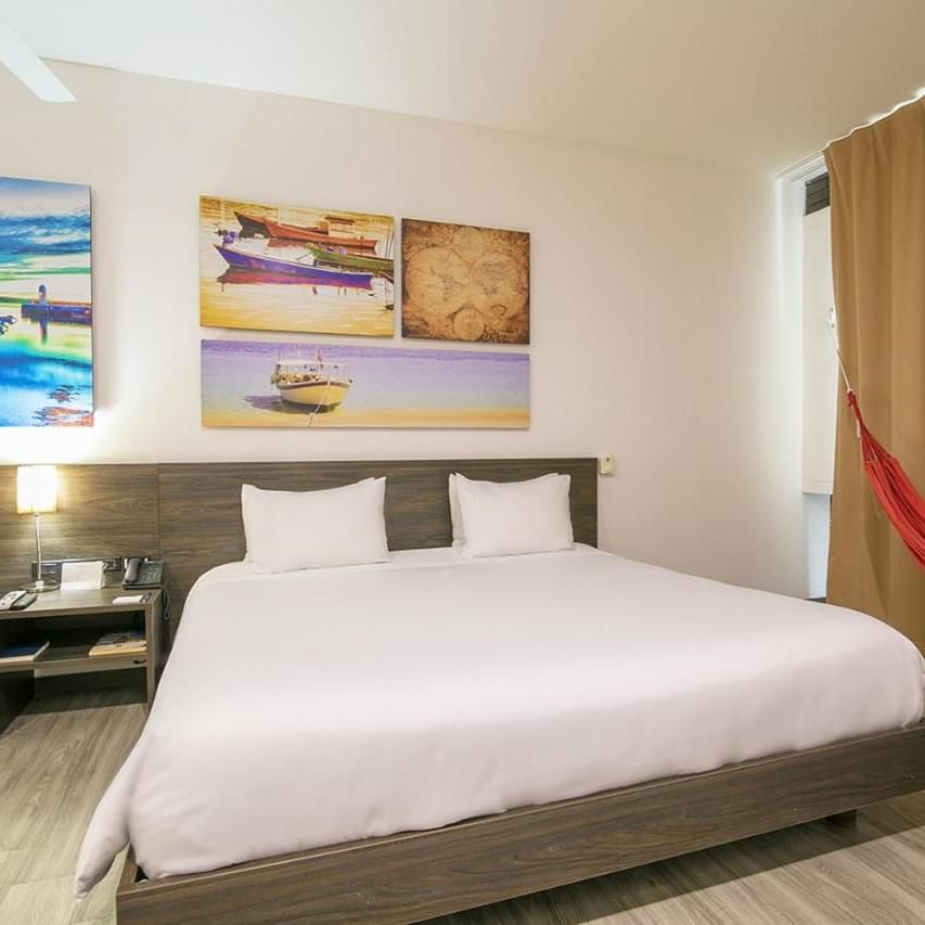 Bedroom arrangement in Wow superior room at DOT Hotels 