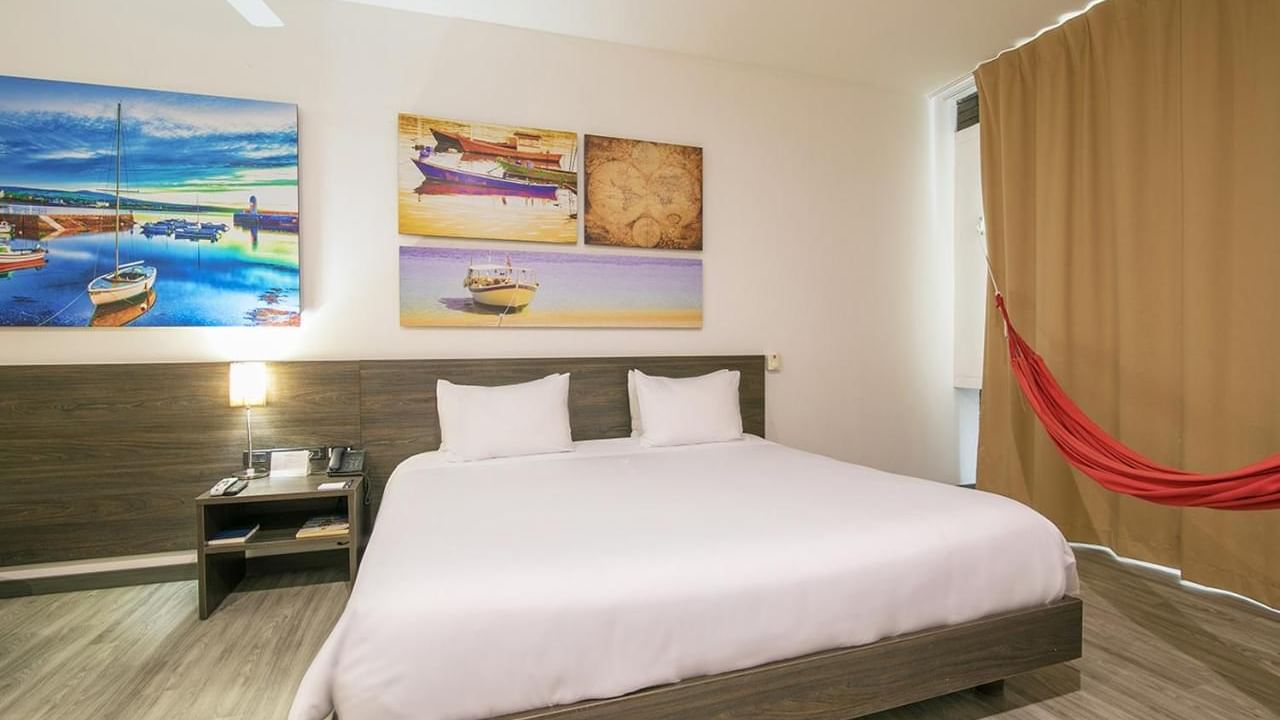 Bedroom arrangement in Wow superior room at DOT Hotels 