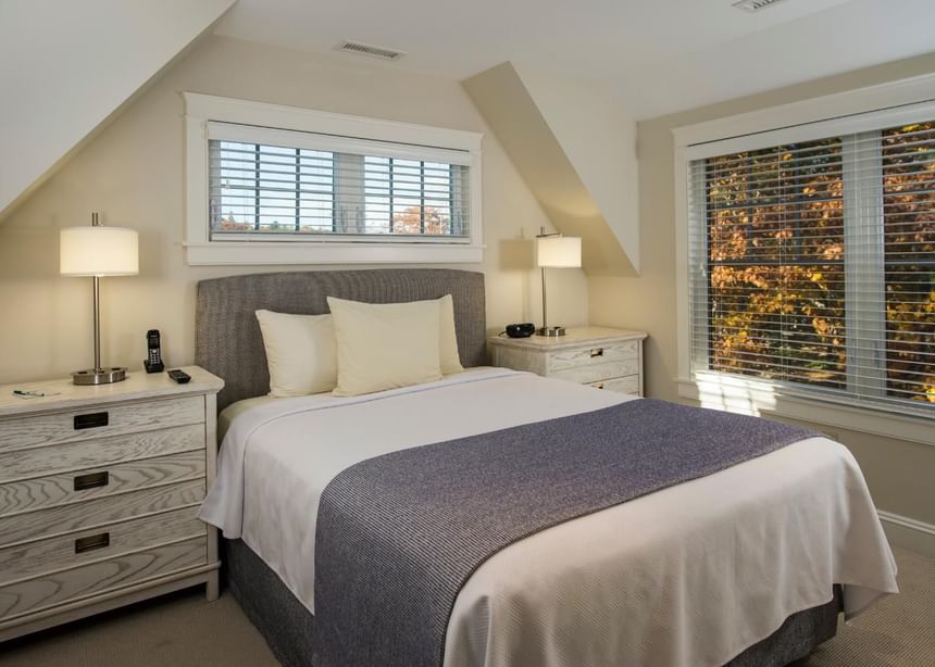 Cozy double bed with city view at Juniper Hill Inn by Ogunquit Collection