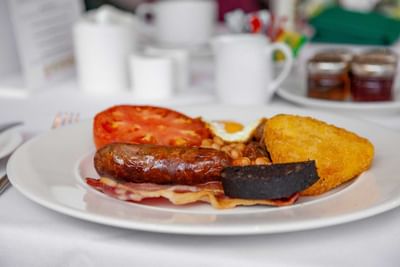 Close-up of a breakfast dish in a menu at Orsett Hall Hotel