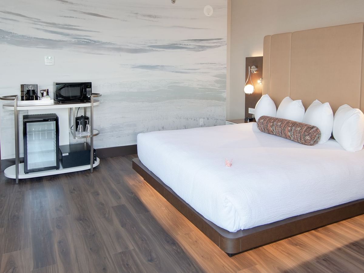 Hotel guestroom with a king size bed