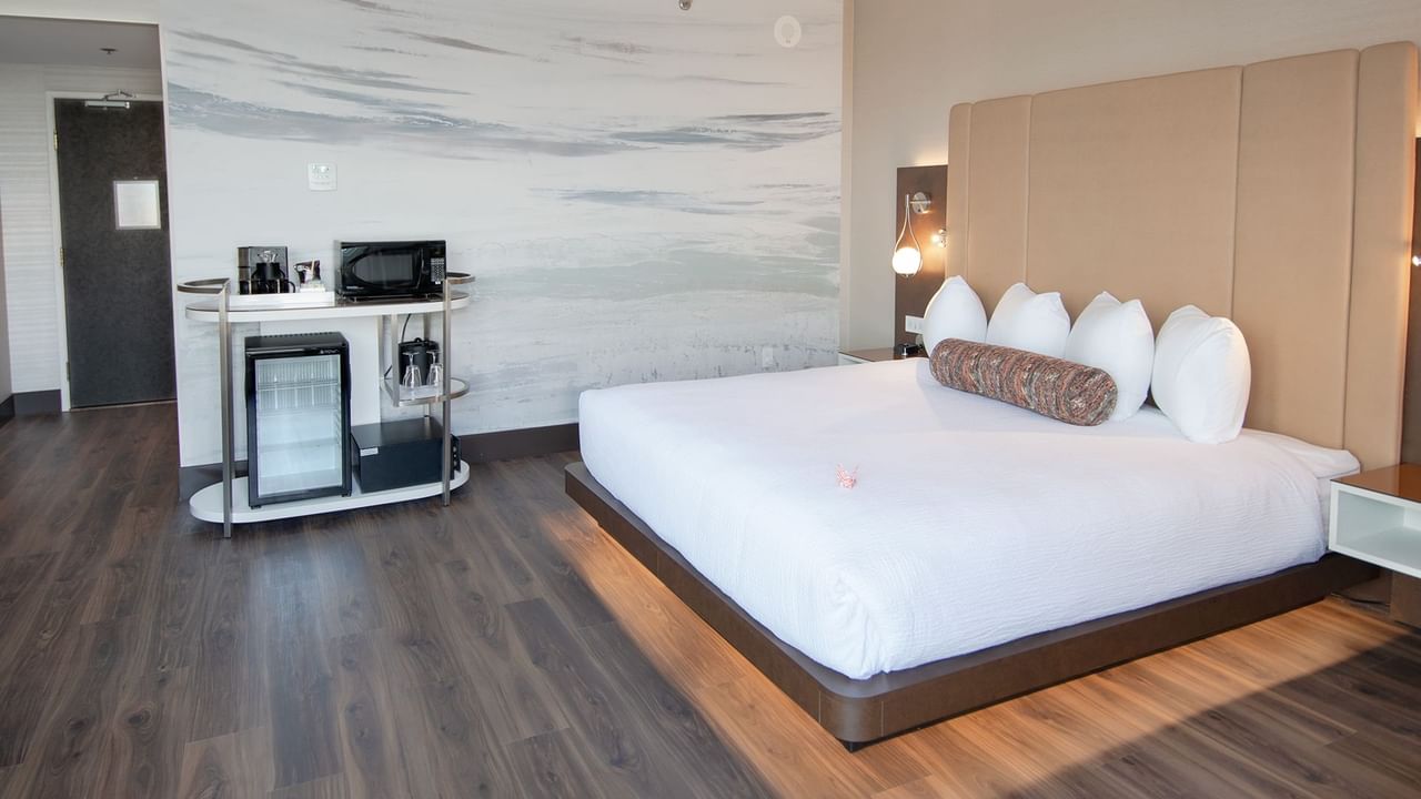 Hotel guestroom with a king size bed