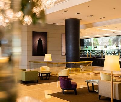 Area with lamps & armchairs in Hotel Emperador Buenos Aires