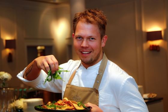 Close-up portrait of a chef working at Hotel Palace Munich