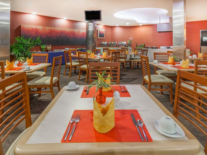 Dining tables set-up in Vento Restaurant at Gamma Hotels