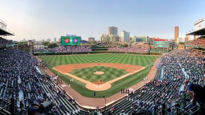 Crowded Wrigley Field during a baseball game with players on the field near Warwick Allerton Chicago