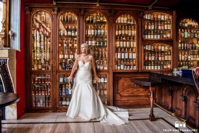 Portrait of a bride in the bar area at Horton Grand Hotel