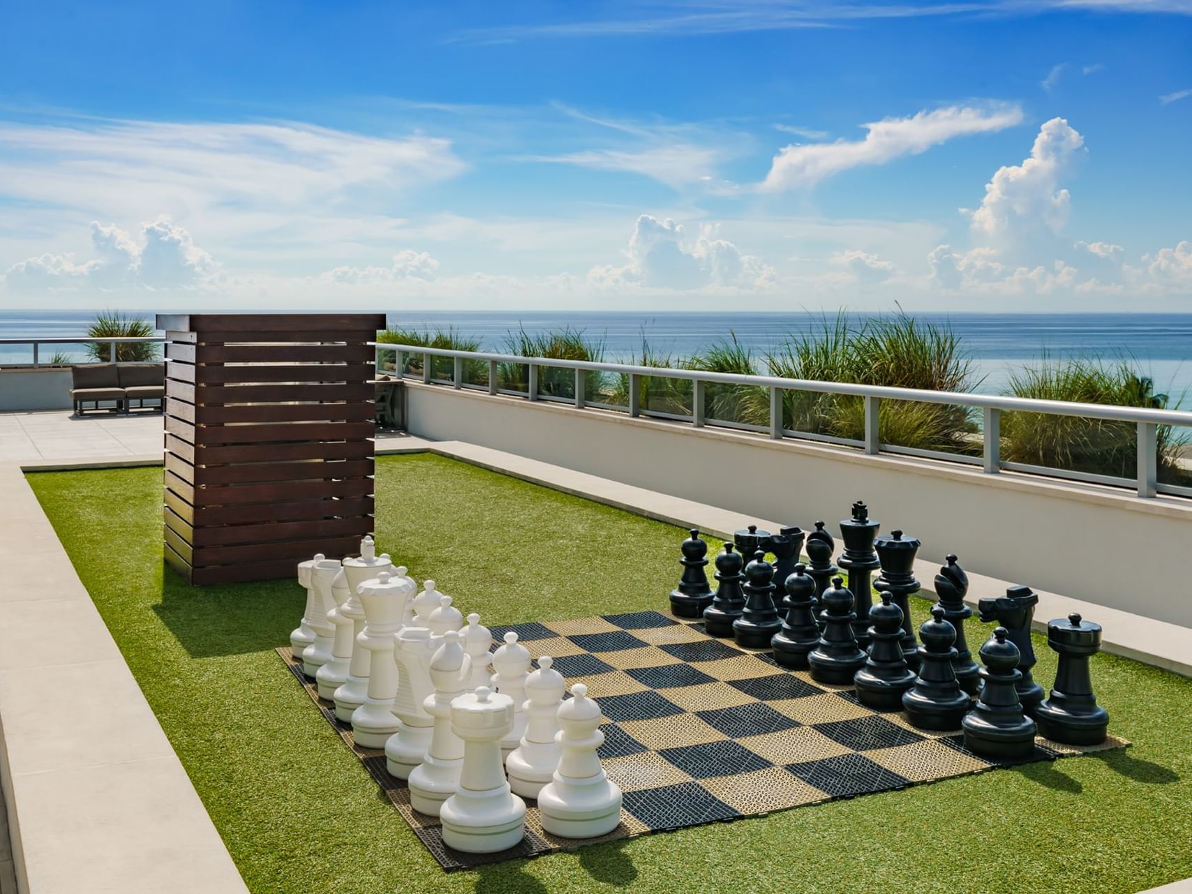 A large chess board on the Costa Rooftop at Costa Beach Resort