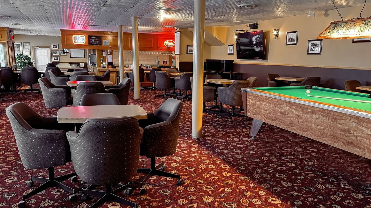 seating and a pool table in the Sluice Box Lounge