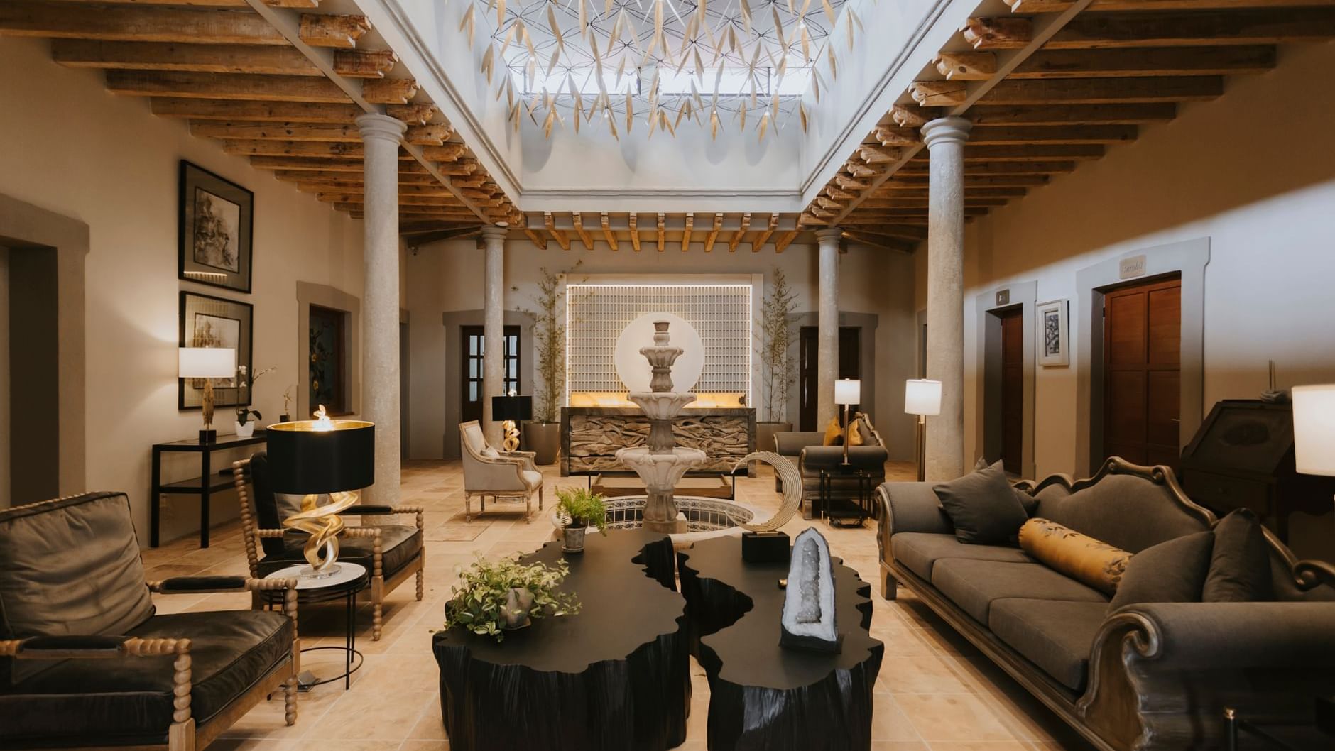 Furniture in the lobby area of Dos Patios Queretaro Curamoria