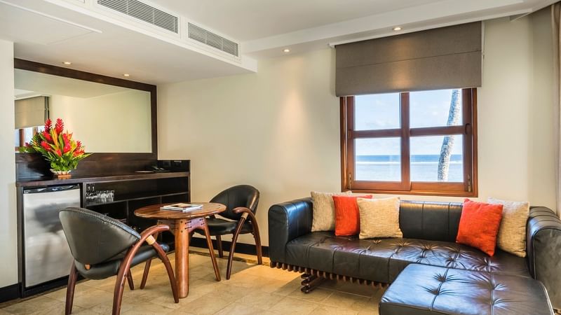 Living room & kitchen area in Warwick Suite at Warwick Fiji