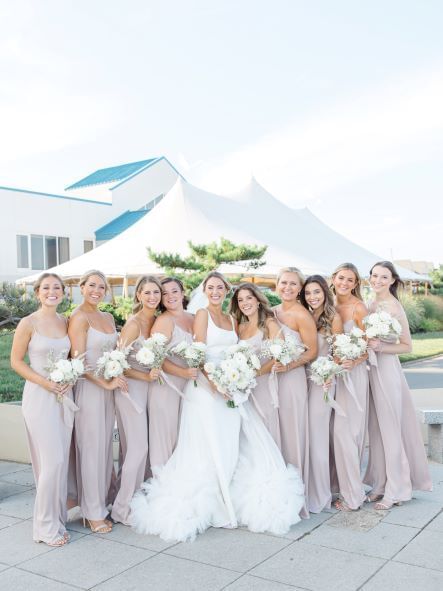 A bride & bridesmaids outside at Ocean Place Resort & Spa