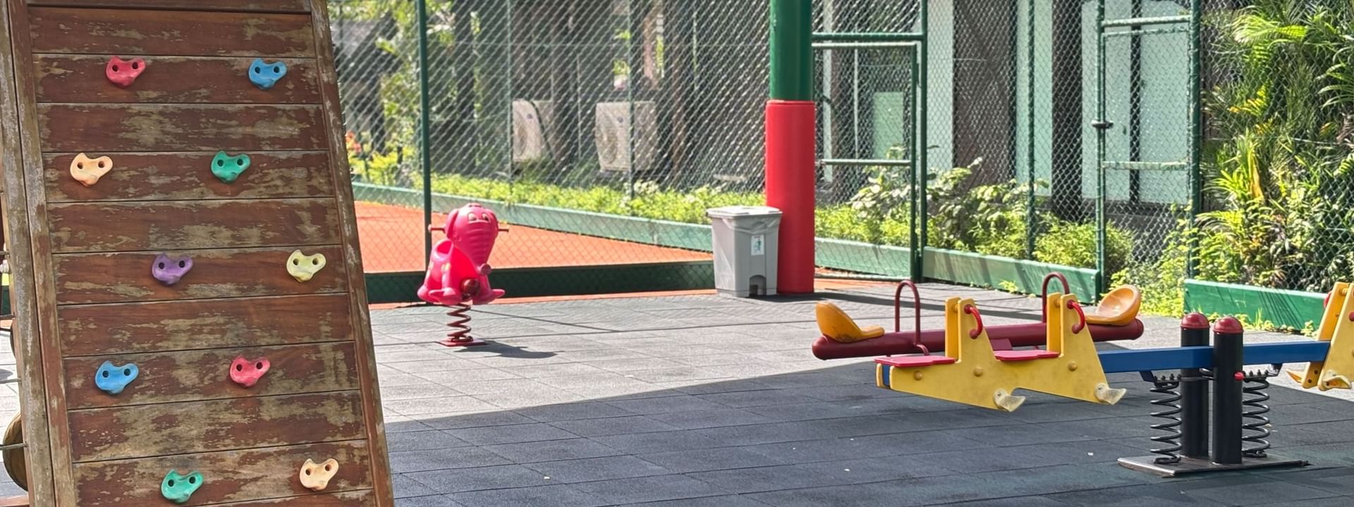 Kids Club playground with climbing wall and seesaw at Warwick Fiji Resort and Spa, Korolevu