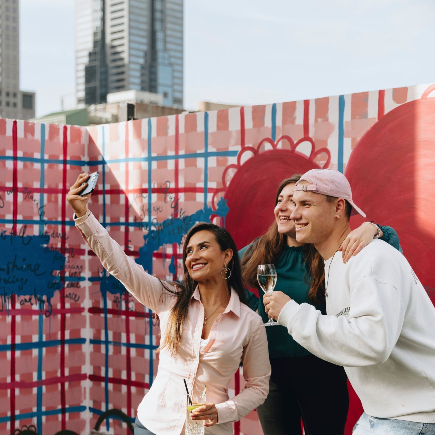 Friends posing to a selfie at Pullman Melbourne CBD