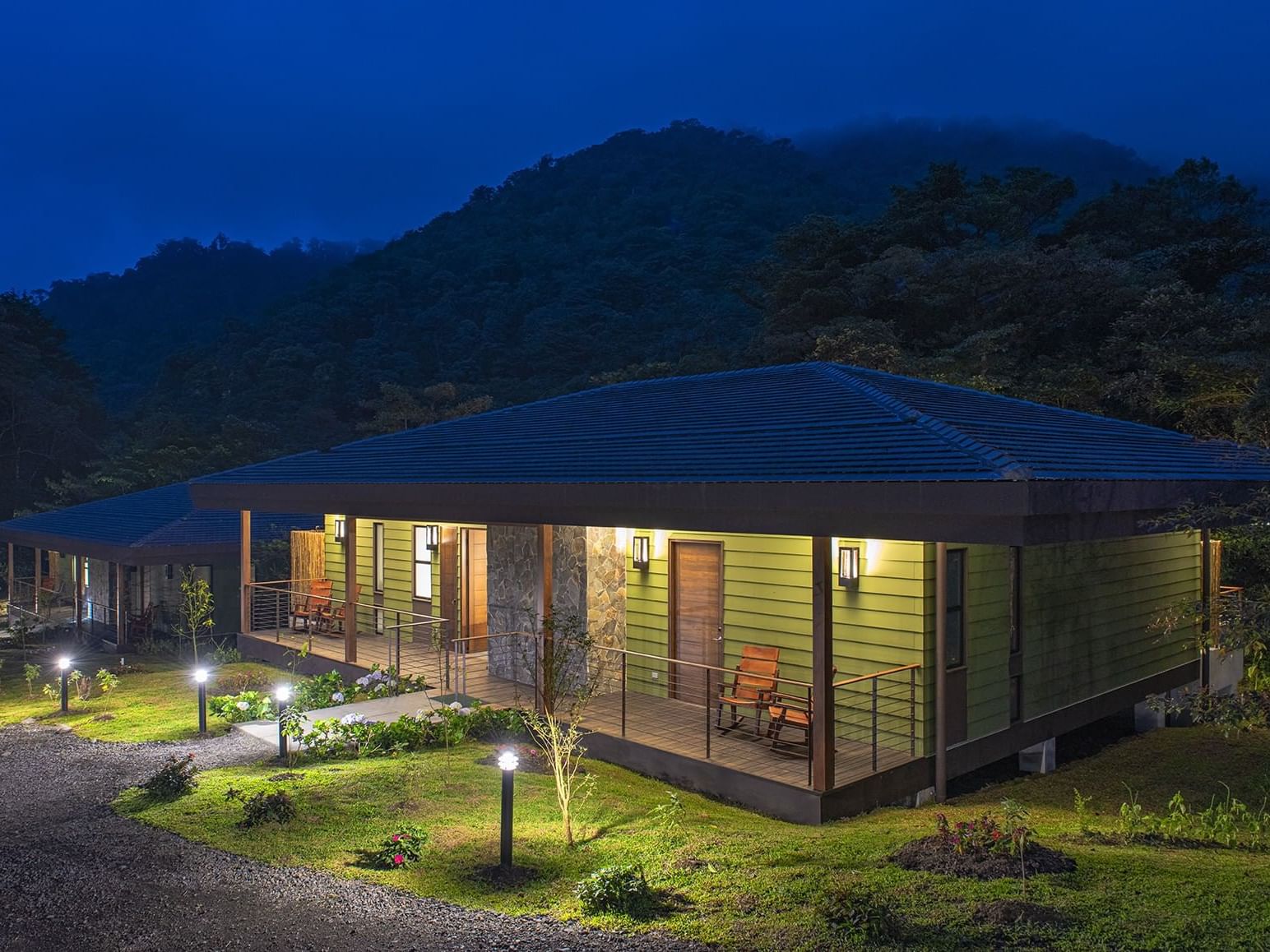 exterior of bungalow with mountains in background