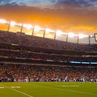 Mile High Stadium with huge crowd near Warwick Denver