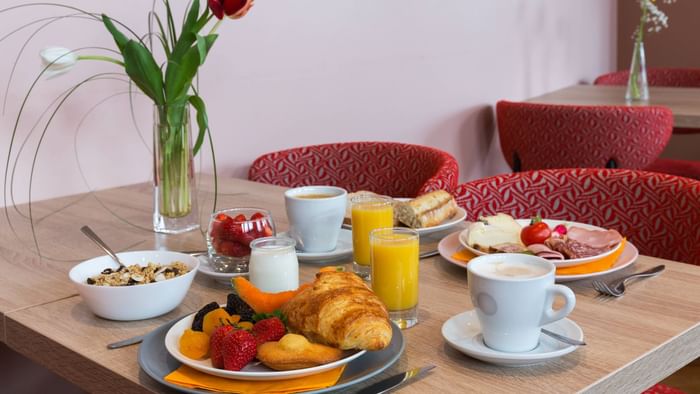 Close up on a table arranged  with food at Hotel Alize