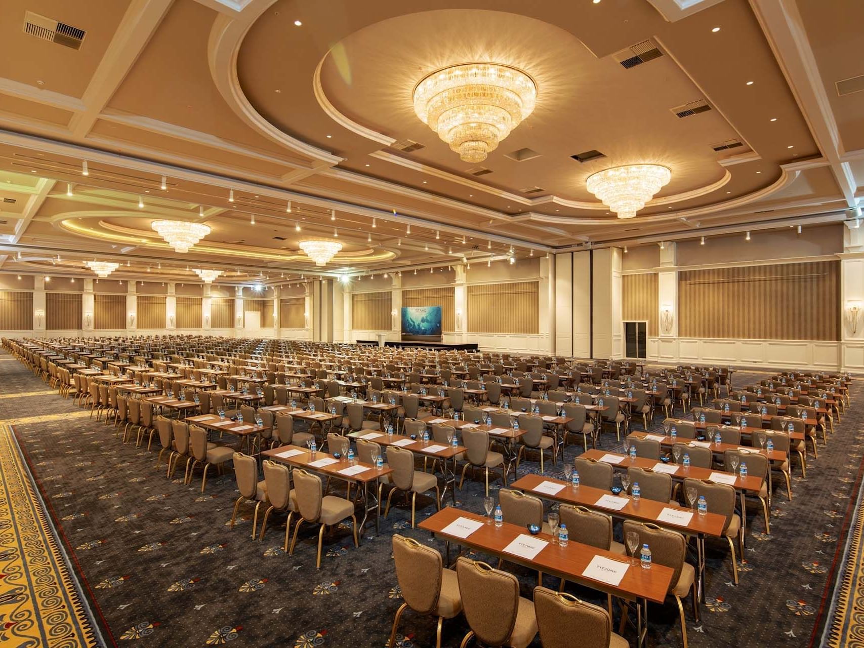 Classroom set-up in Pacific Main Saloon with carpeted floors at Titanic Deluxe Golf Belek