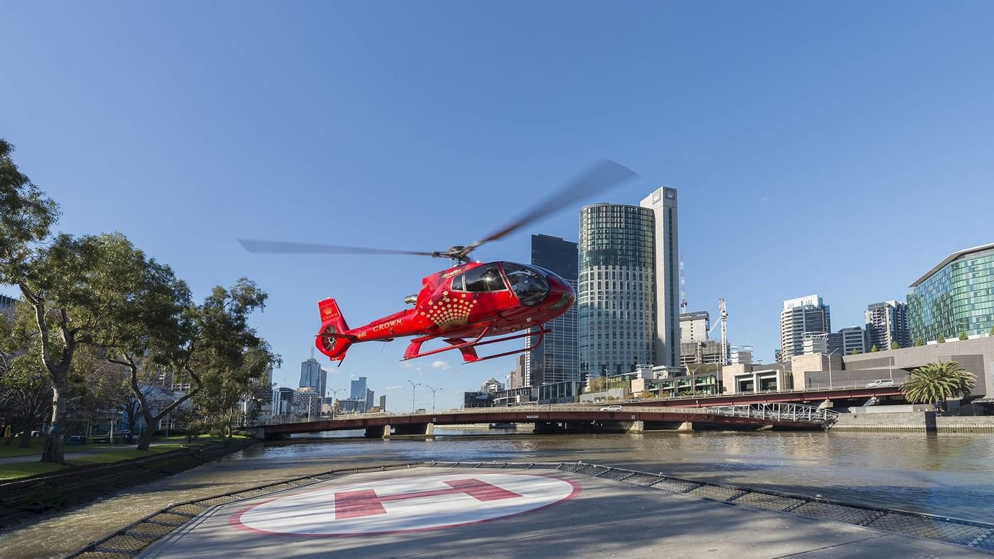 Helicopter landing on helipad at Crown Hotels