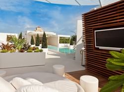 Rooftop cabana with sofa bed & TV at Dream South Beach