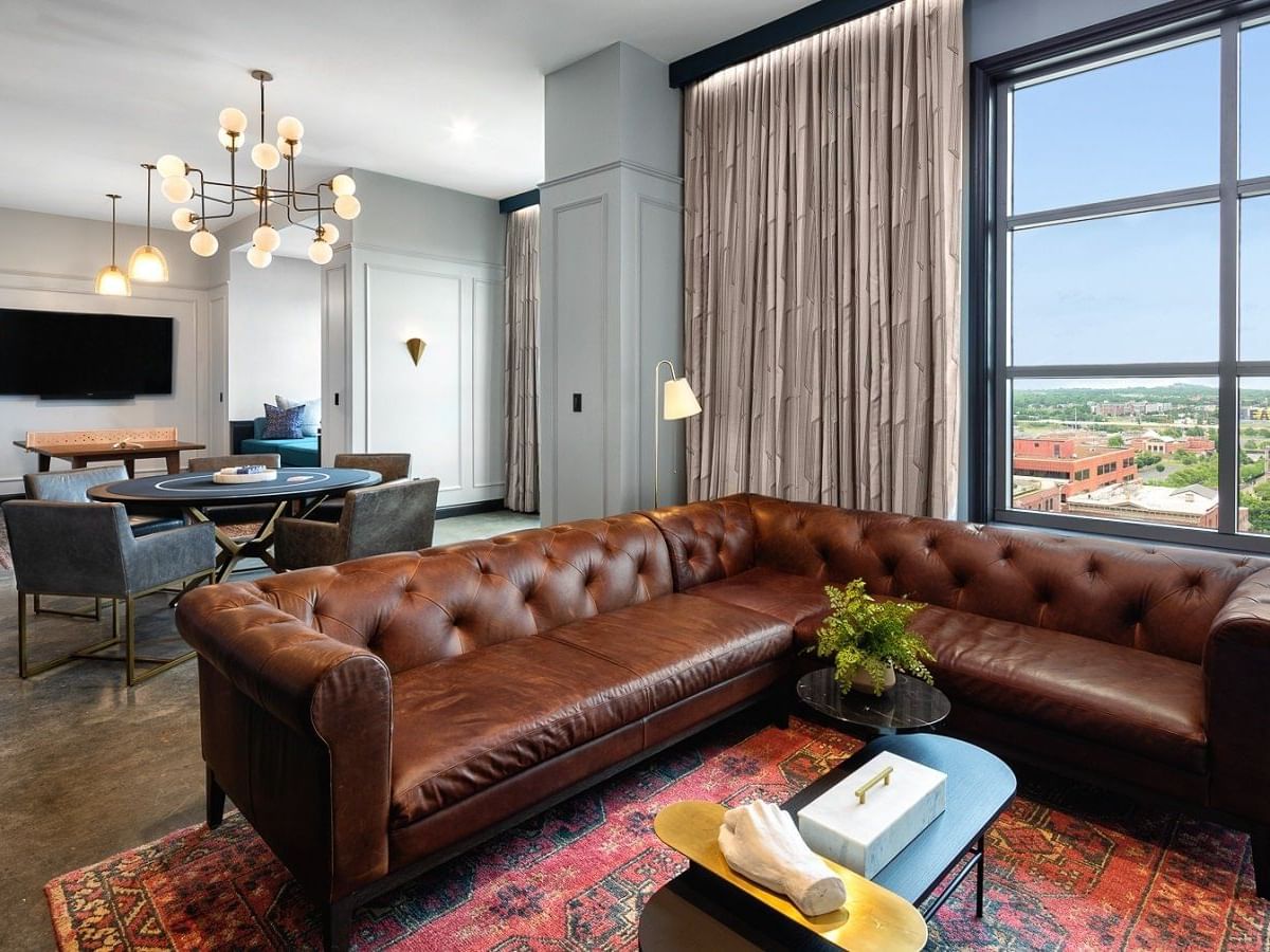 sofa set with a dining room in Guest House at Dream Nashville