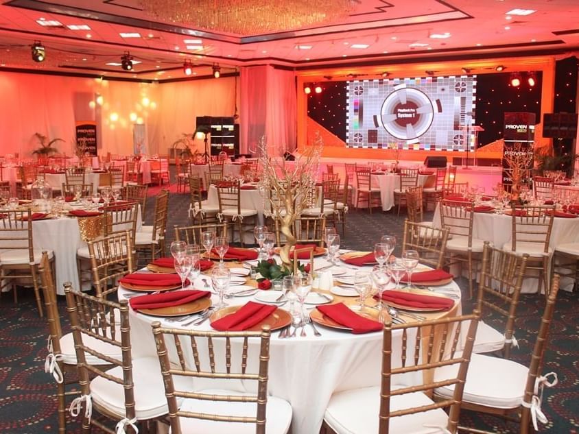 Banquet set-up with a digital screen in Port Antonio Suite at Jamaica Pegasus Hotel
