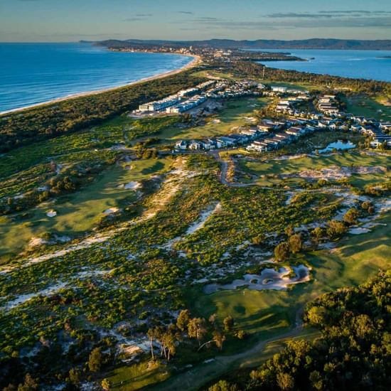 Aerial view of golf course near Pullman Magenta Shores Resort