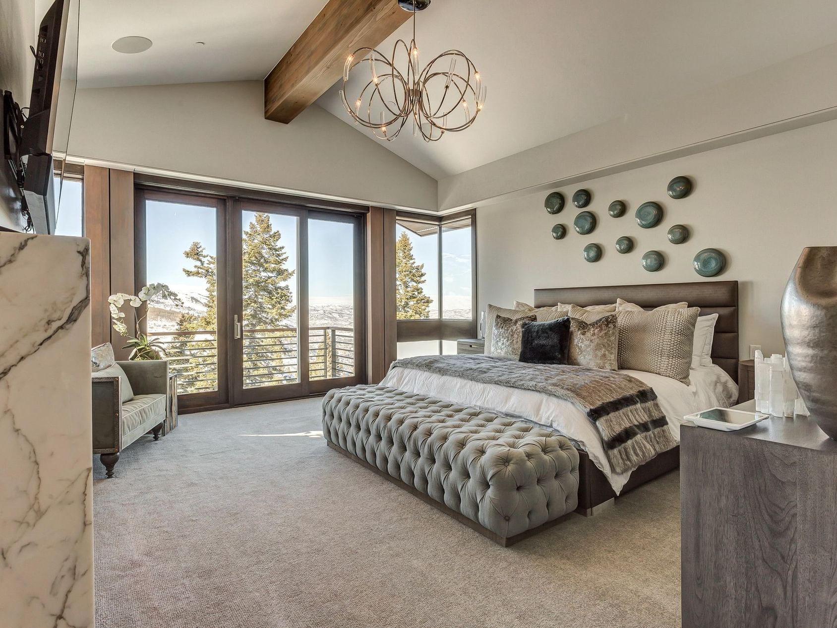 Cozy bedroom featuring a king bed with a serene view in Six-bedroom Home at Stein Eriksen Residences
