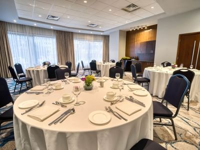 Elegant dining area with set-up banquets at Matrix Hotel
