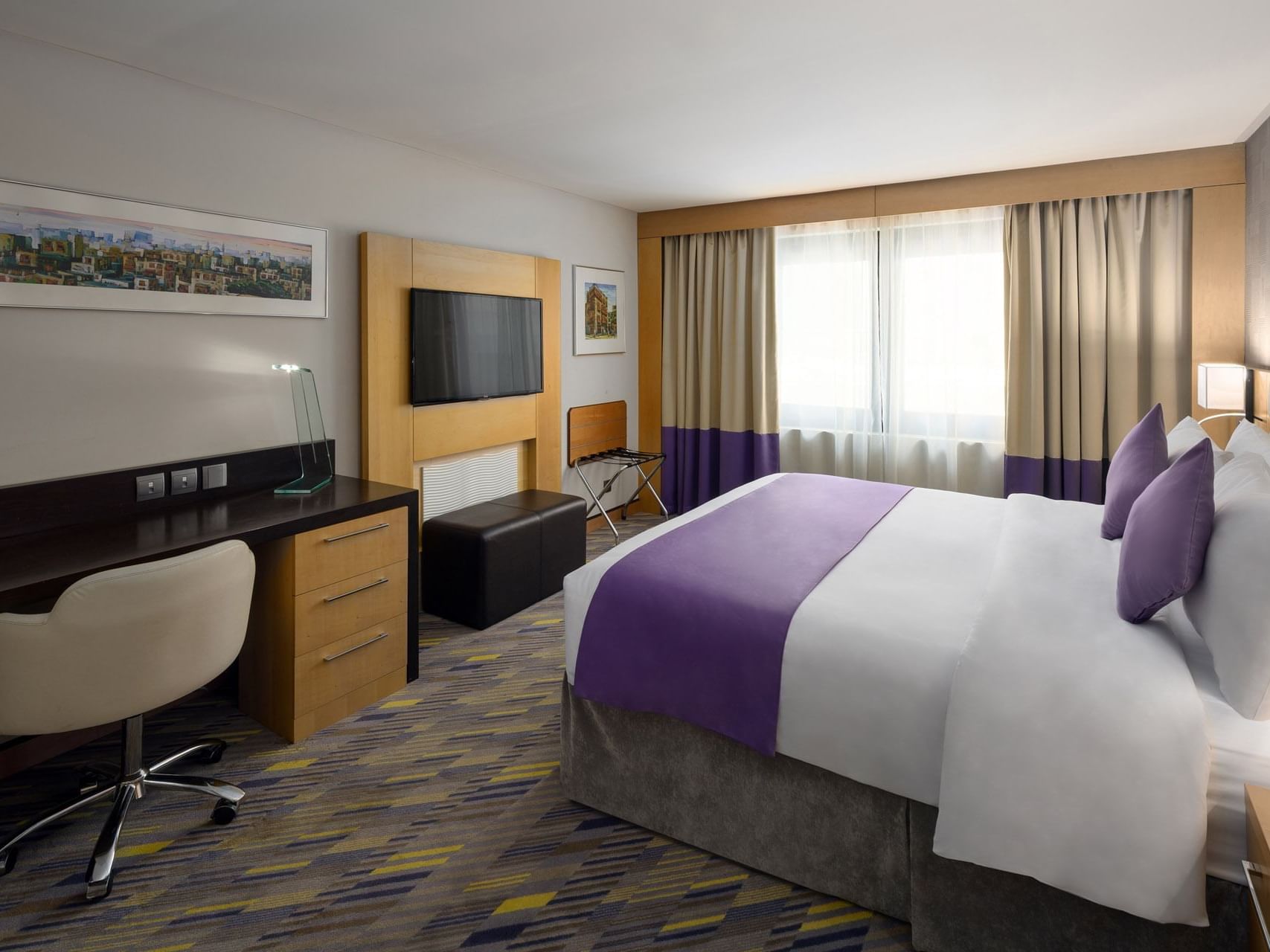 A bedroom with a kingbed at Mena ApartHotel Albarsha Dubai