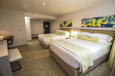 two beds in a hotel room
