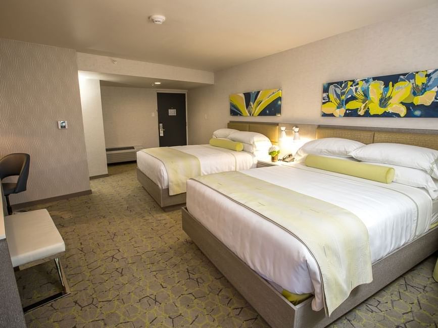 two beds in a hotel room