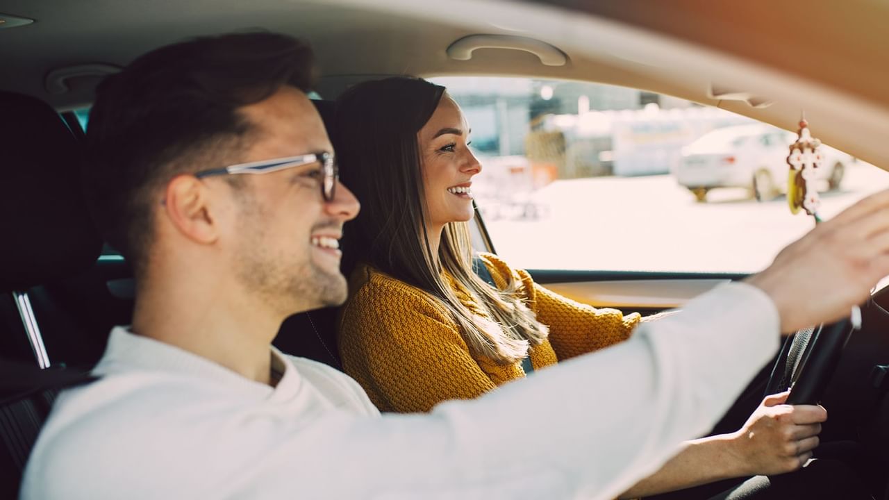 man and women in car