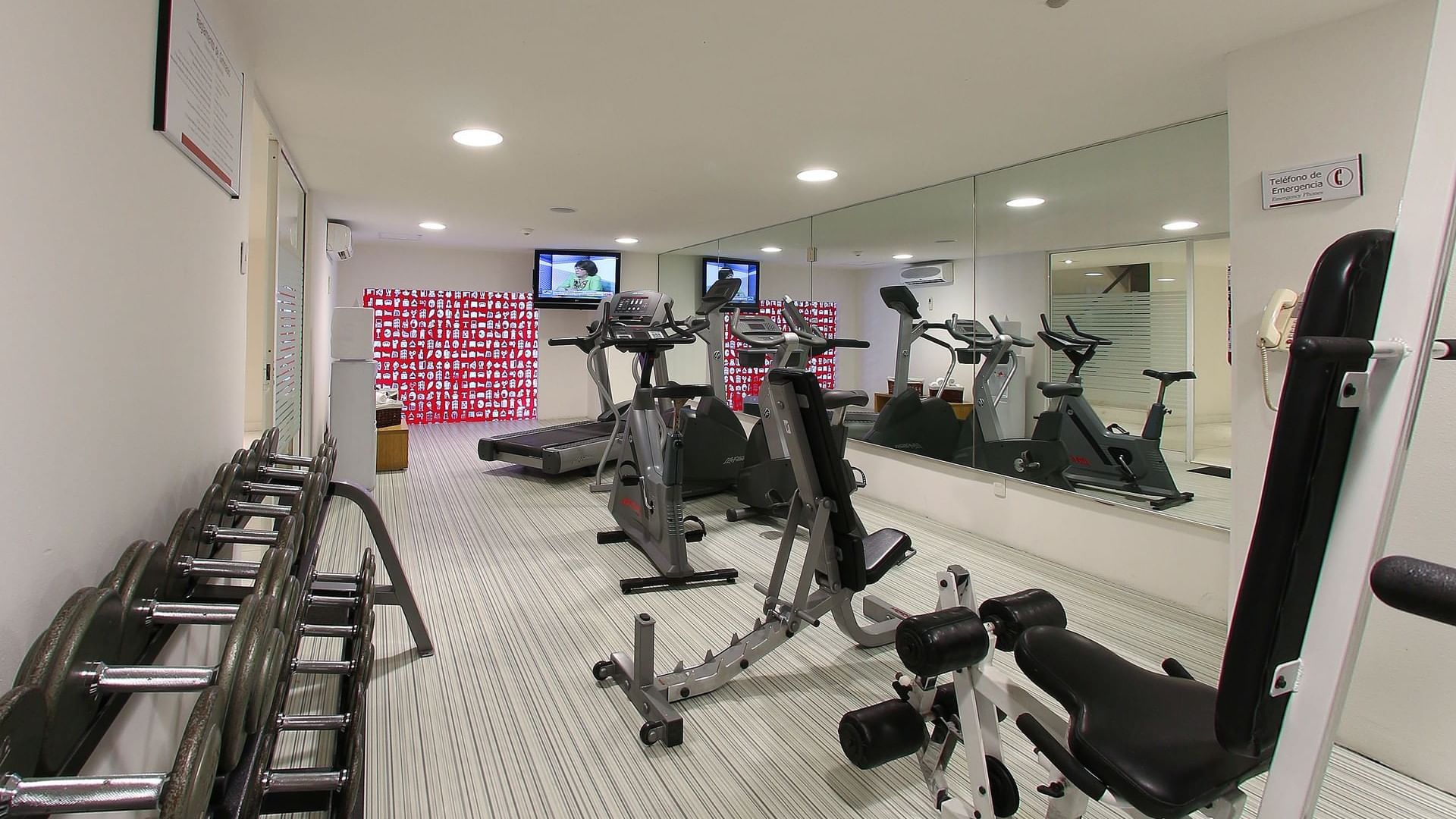 Fully equipped fitness center at Fiesta Inn Naucalpan