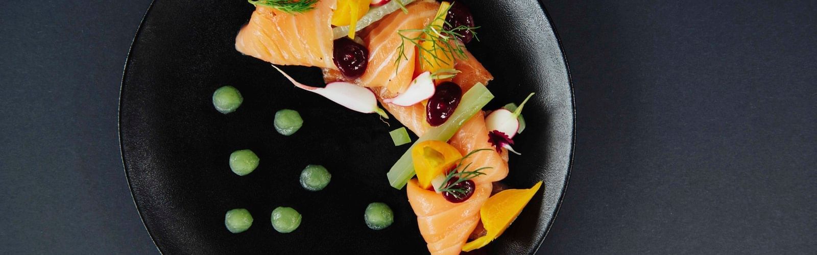 Close-up of delicious food plate served at Pullman Port Douglas Sea Temple Resort & Spa