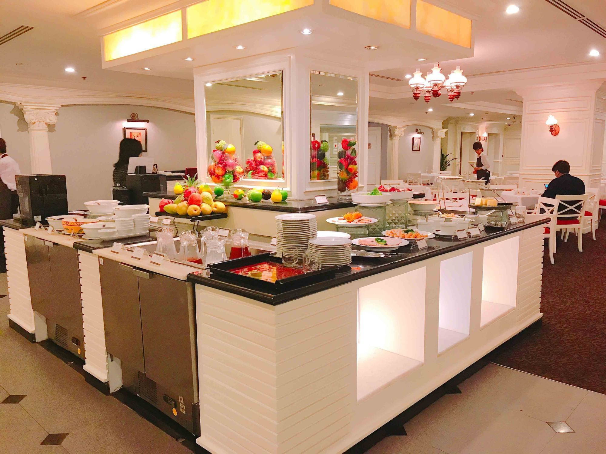Buffet display arranged by the dining area in The Restaurant at Sunway Hotel Hanoi