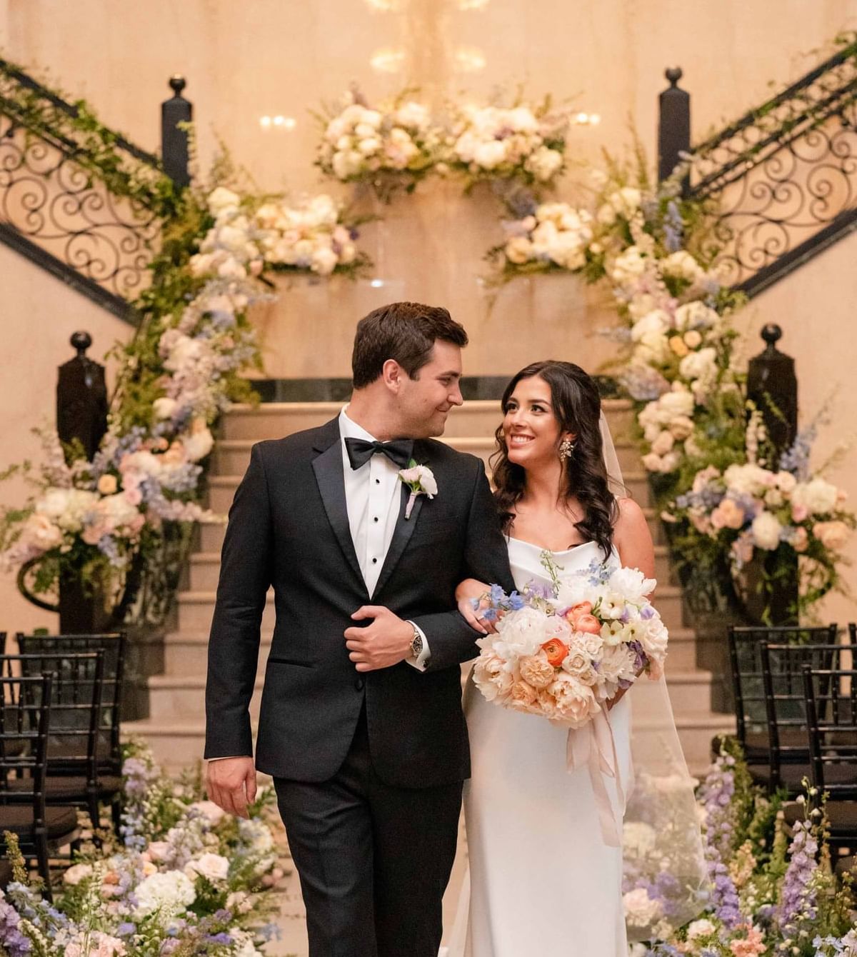Bride & groom in wedding ceremony at The Mayo Hotel