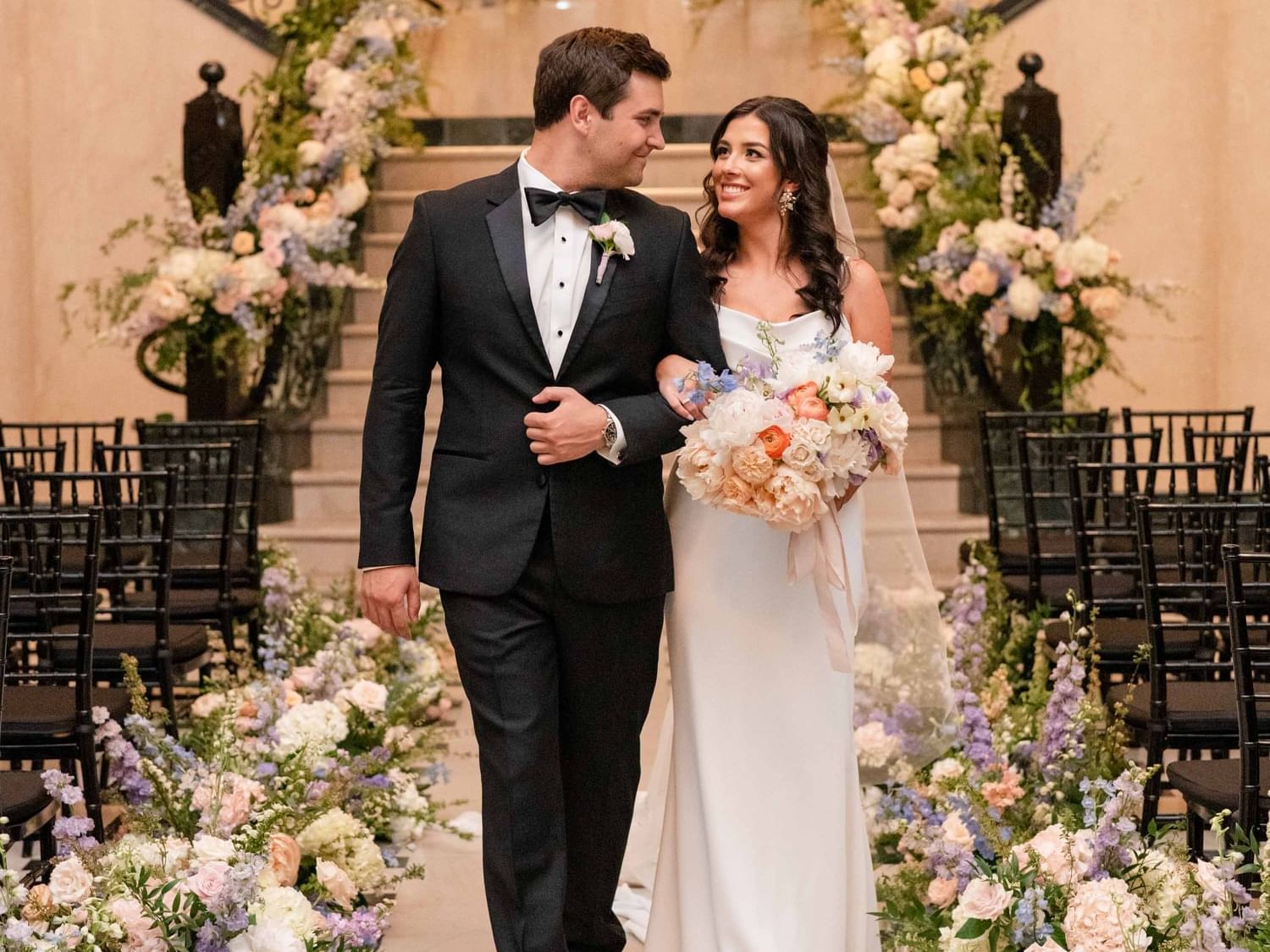 Bride & groom in wedding ceremony at The Mayo Hotel