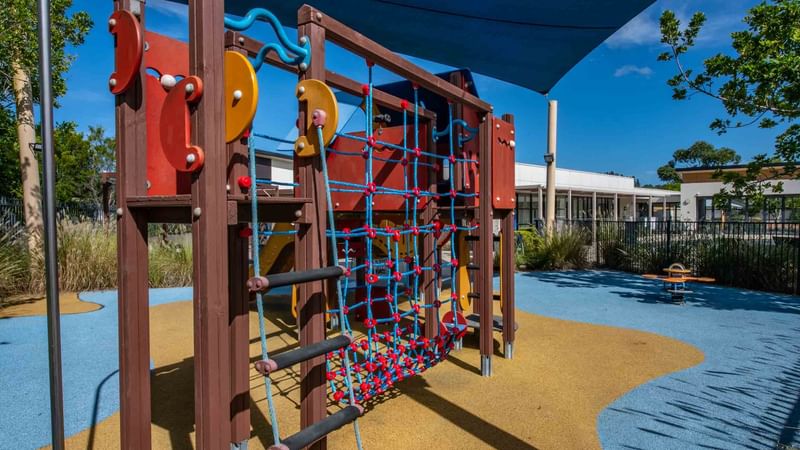 Colorful playground with climbing structures at Mercure Kooindah Waters