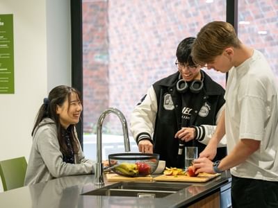 UL Auckland Central Students Enjoying the Kitchen