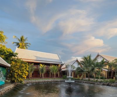 Fountain in pond by the entrance at U Luang Prabang