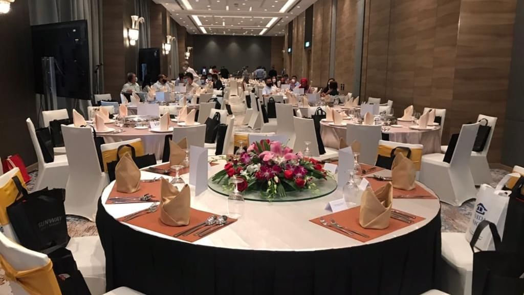 Banquets decorated with flowers for an event at Sunway Hotel Big Box